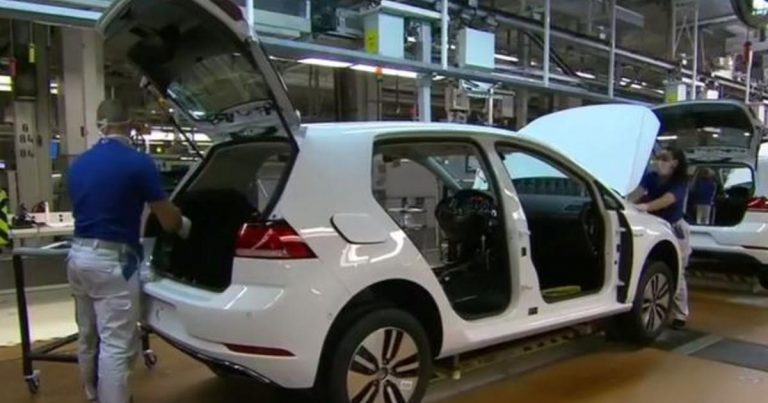 Huge Volkswagen auto plant cautiously ramps back up after coronavirus shutdown