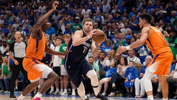 Doncic leads Mavericks to series-tying win as Suns struggle with foul trouble